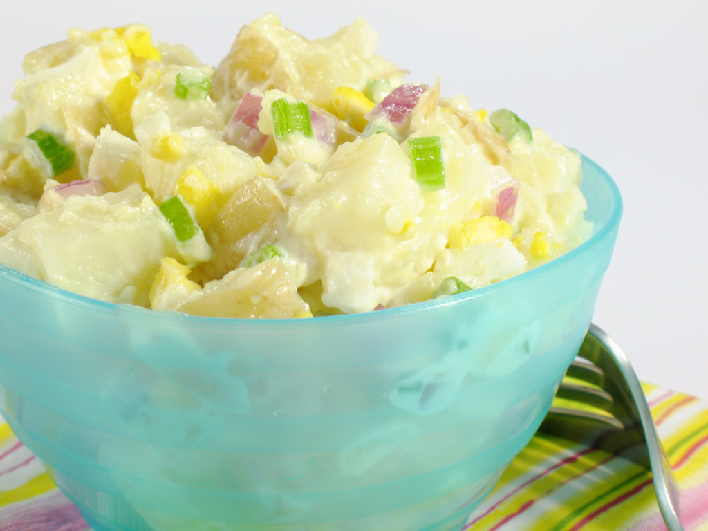A delicious bowl of creamy potato salad.